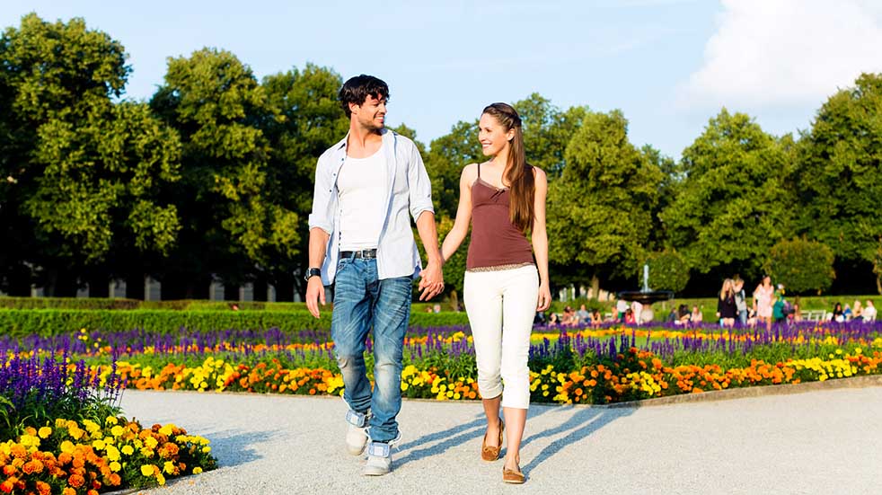 10 socially distanced days out couple walking in garden